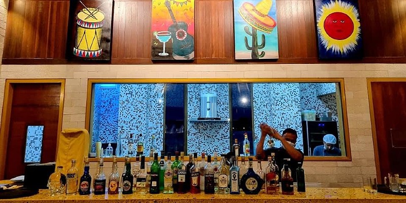 Barman making cocktails at Udhares Bar