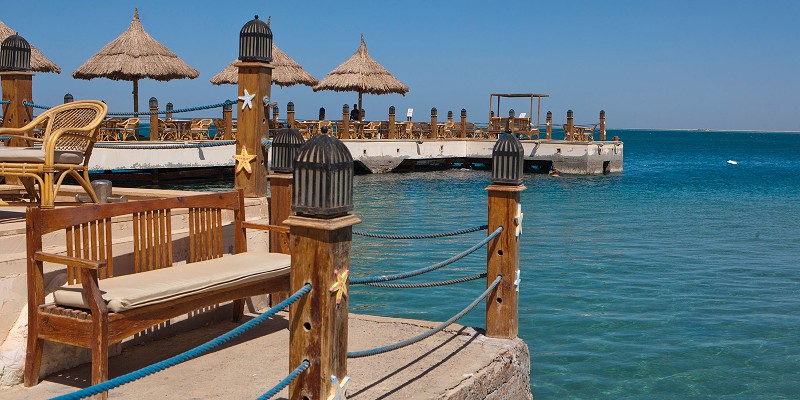 An empty bench at the waterfront in Hurghada