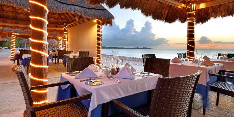 Dining tables overlooking the Caribbean Sea