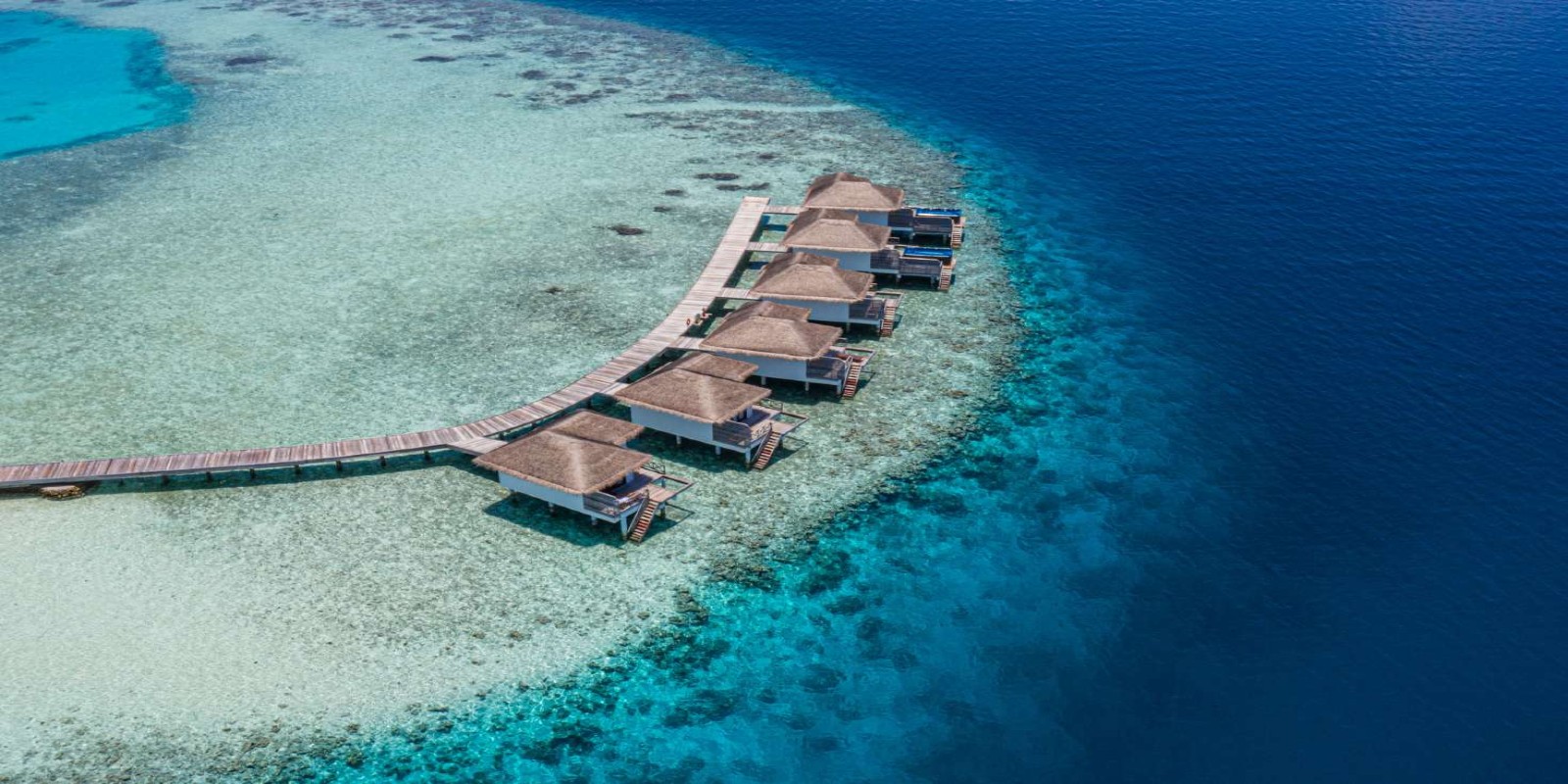 water villas over the indian ocean in the maldives